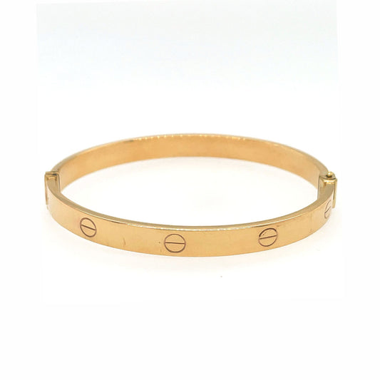 Yellow Gold Love-Inspired Bracelet with Fashionable Accents