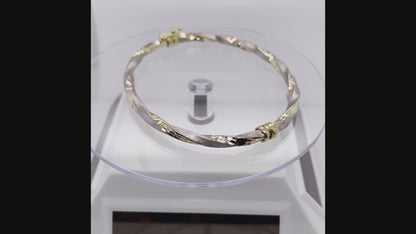 Twisted 3-Tone Gold Bangle in White, Yellow, and Rose Gold